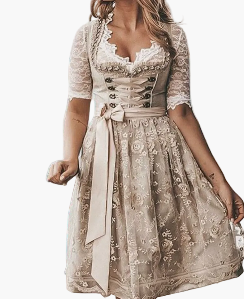Damernas traditionella dirndlklänning med snörliv och spetsblus – perfekt för Oktoberfest och folkfester