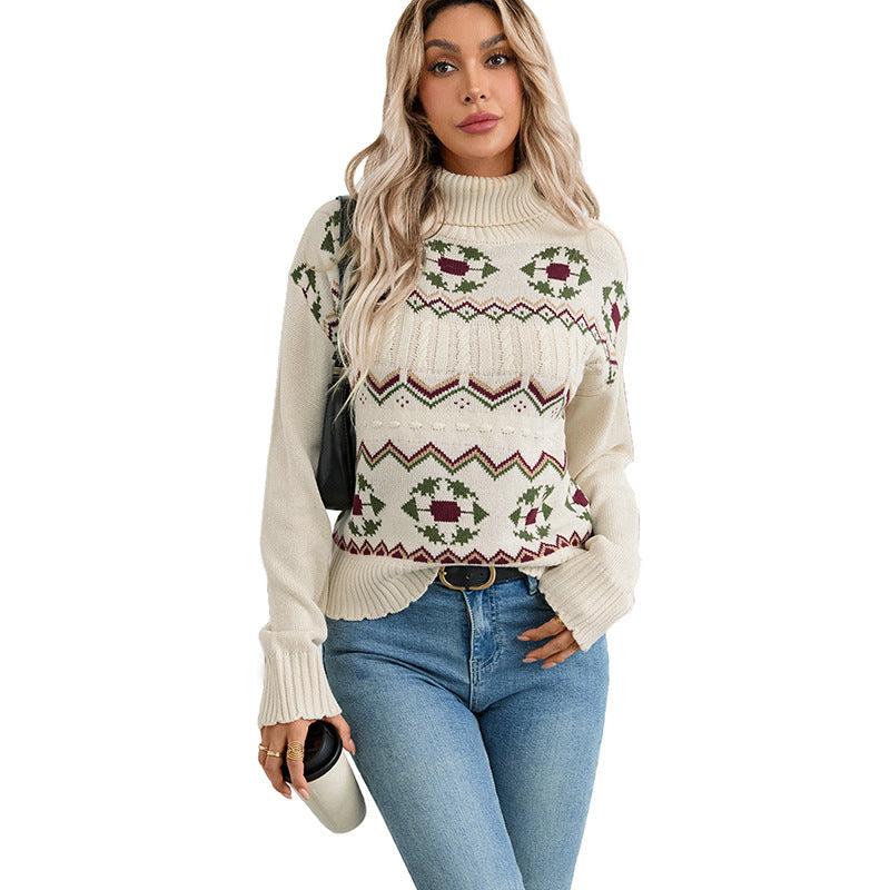 Damtröja i stickat material med polokrage och fair isle-mönster, ljusbeige