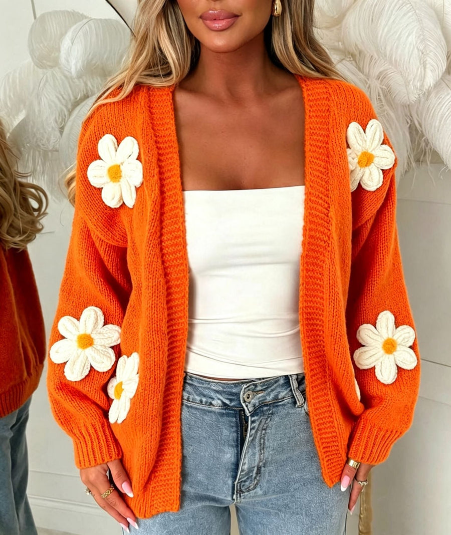 Damkofta med stickade blomdetaljer, öppen front, enfärgad design