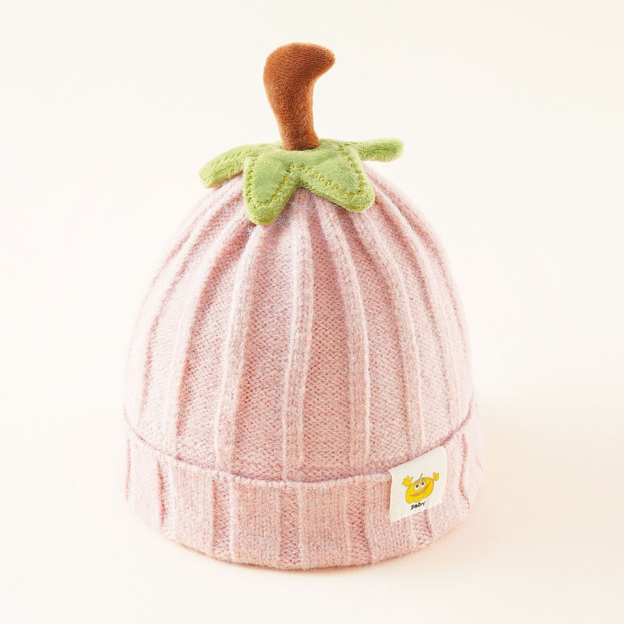 Baby stickad mössa med pumpadesign och ribbad struktur