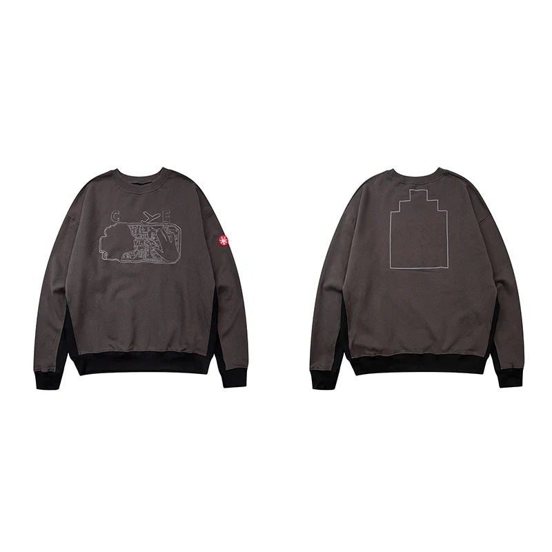 Grå Sweatshirt med svartvit tryck, rund hals och lång ärm