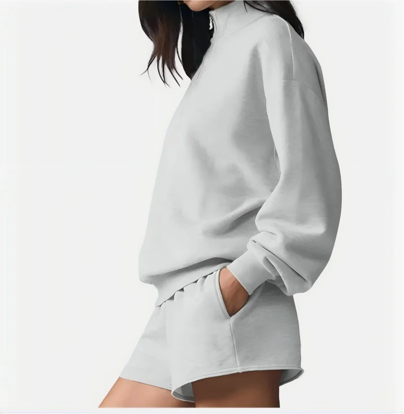 Grått set med halvzip-tröja och matchande shorts