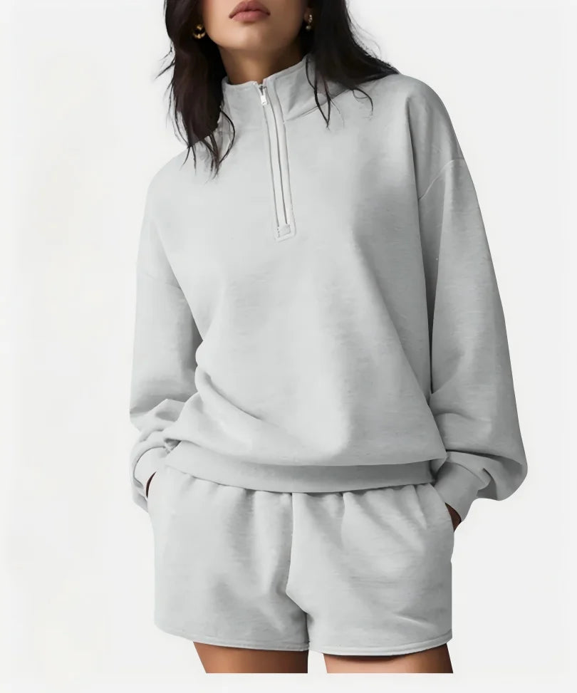 Grått set med halvzip-tröja och matchande shorts