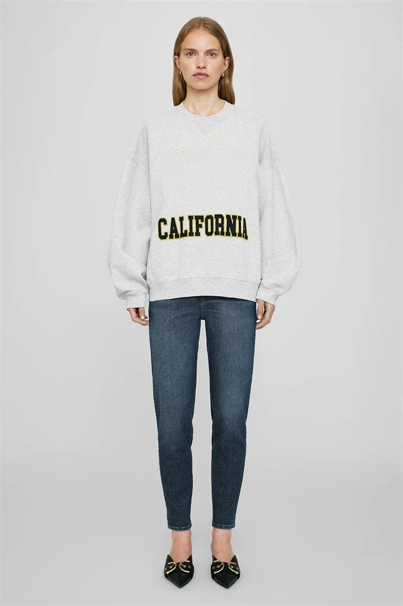 Dam sweatshirt grå med "PARIS" tryck rund hals oversized