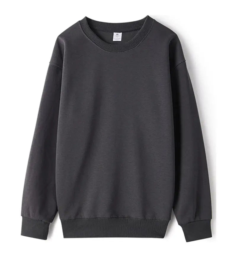 Enkel enfärgad sweatshirt med rund hals och lång ärm