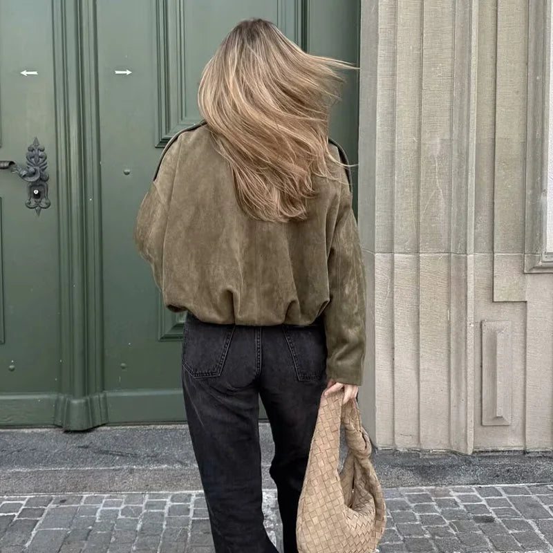 Grön kort jacka med krage och oversized passform