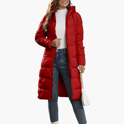 Dam lång quiltad vinterjacka med huva – trendig puffer för vardag och streetwear