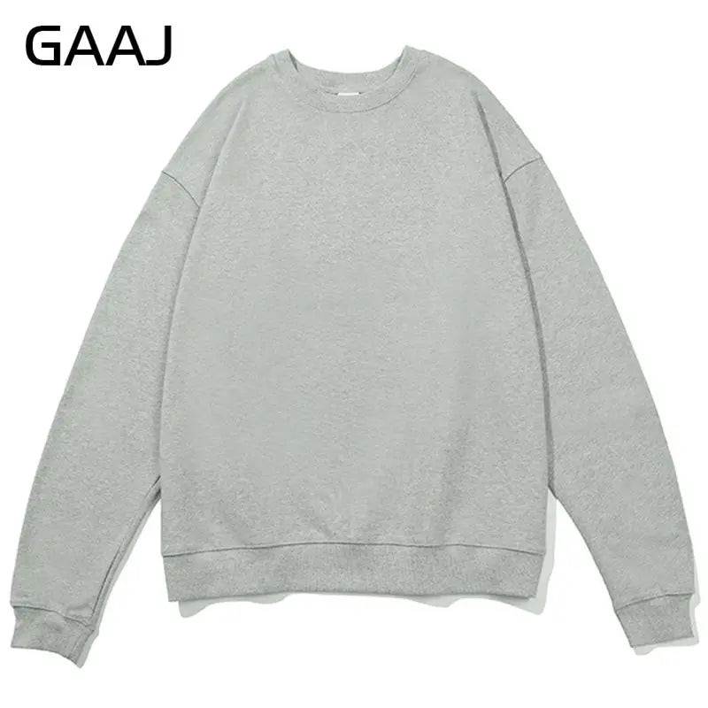 Enkel sweatshirt med rund hals, enfärgad och ribbade muddar