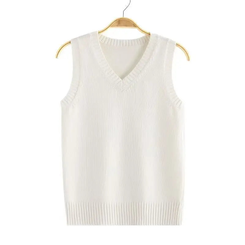Unisex stickad slipover med V-ringning och ribbade muddar, enfärgad