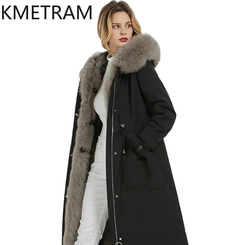 Svart damkappa med fuskpälsfodrad huva och midjedragsko