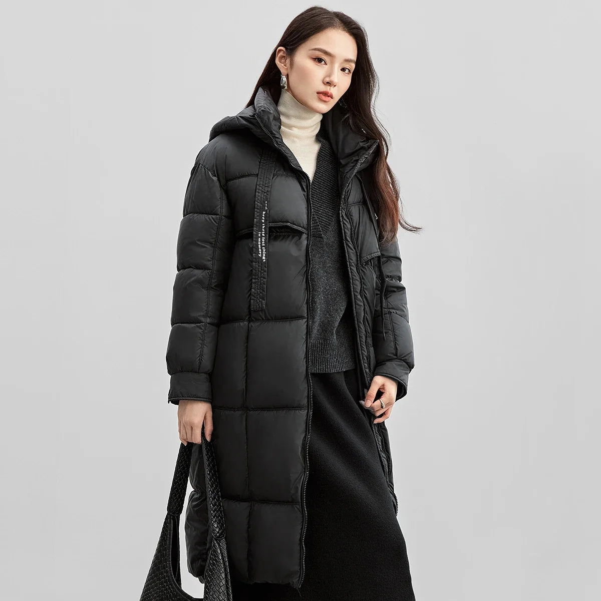 Lång vadderad parkas för dam med huva, dragkedja och fickor