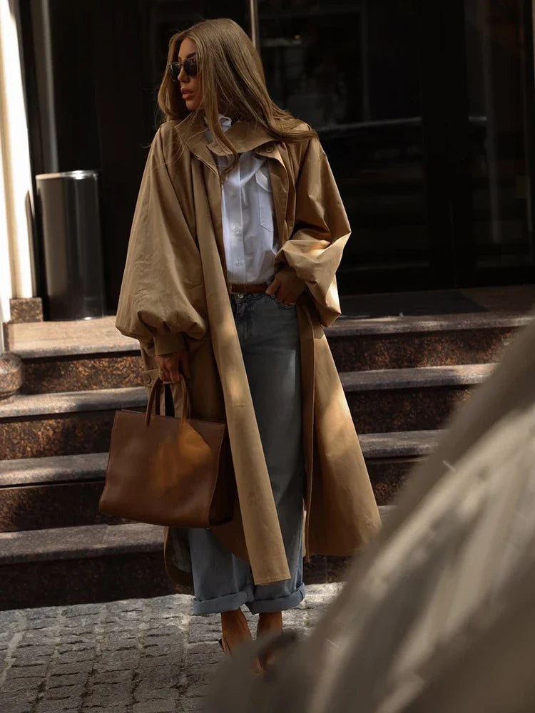 Lång trenchcoat för dam med ståkrage och ballongärm