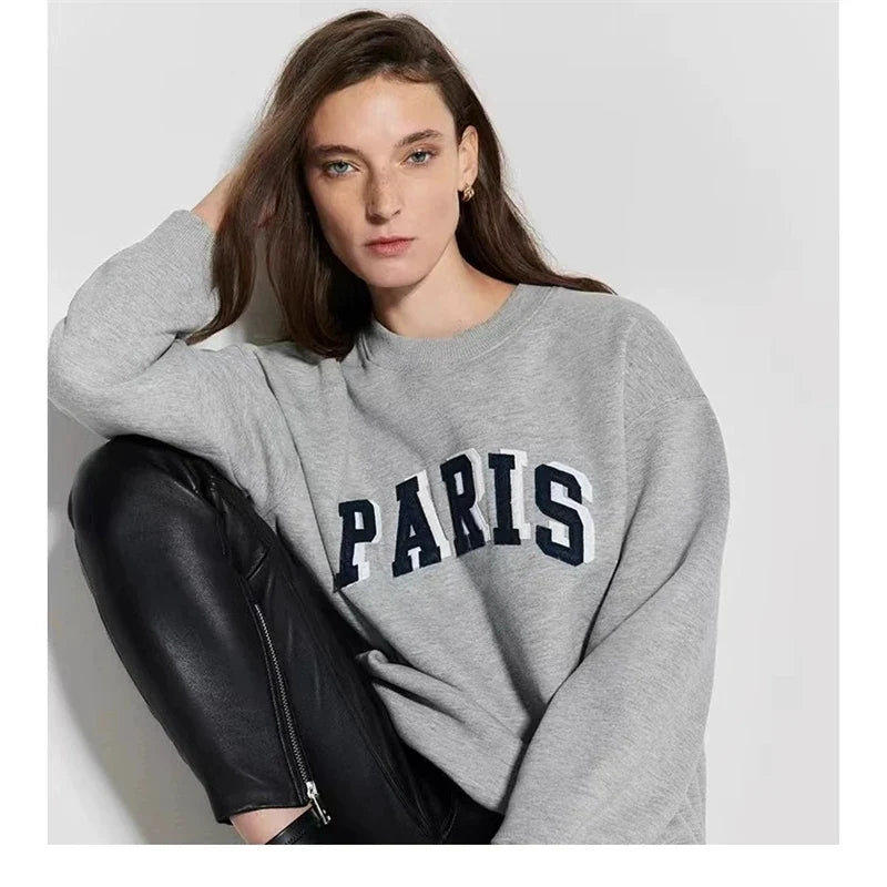 Dam sweatshirt grå med "PARIS" tryck rund hals oversized