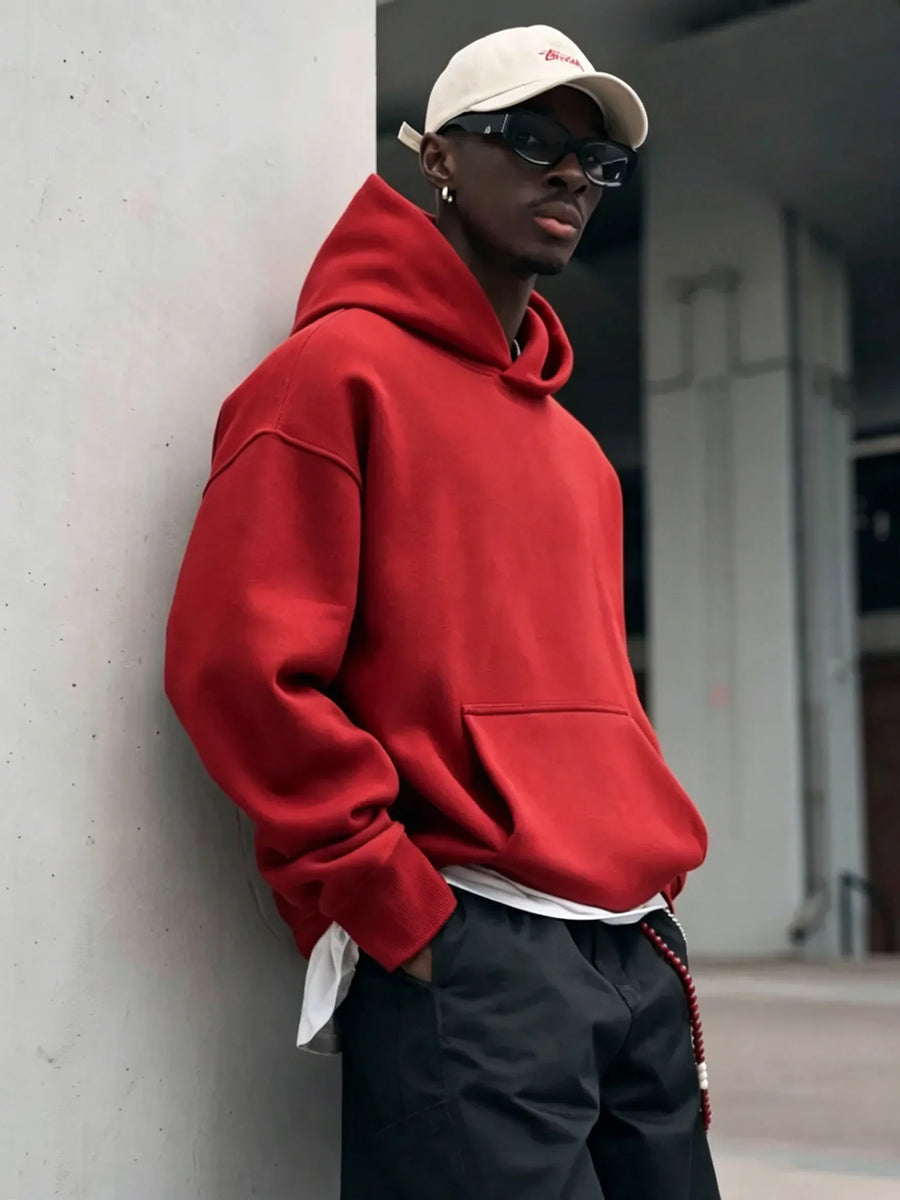 Män Oversize Hoodie med Känguruficka och Huva i Enfärgade Material
