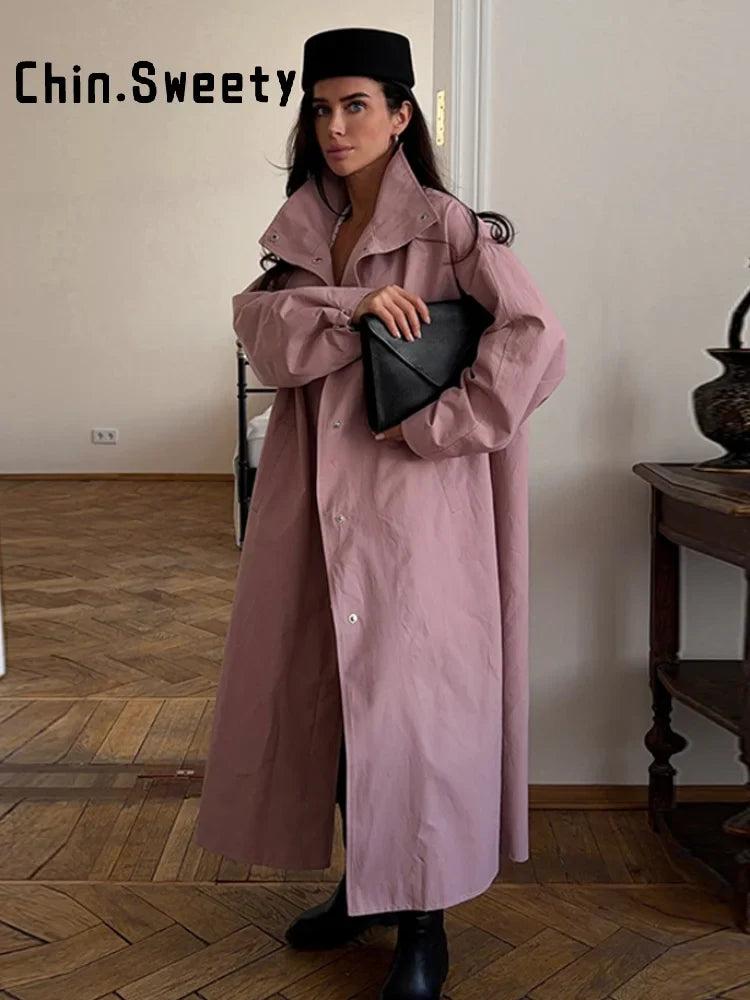Lång trenchcoat med hög krage och puffärmar för dam