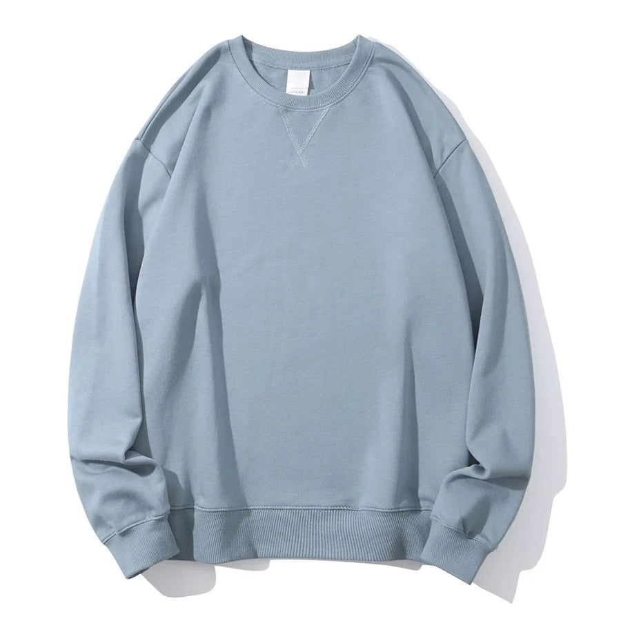 Unisex sweatshirt med rund hals, enfärgad design och ribbade muddar