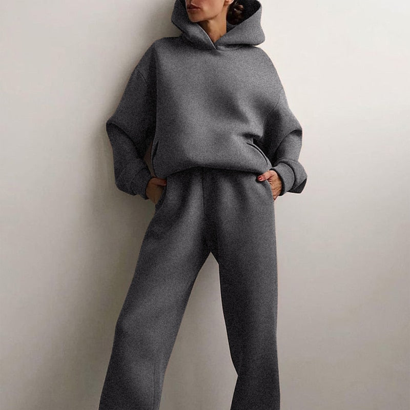 Damers mysigt tvådelat lounge-set med hoodie och joggingbyxor – perfekt för hemmabruk och avslappnad stil