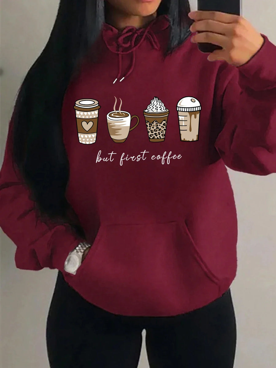 Huvtröja med "but first coffee"-tryck, känguruficka och dragsko
