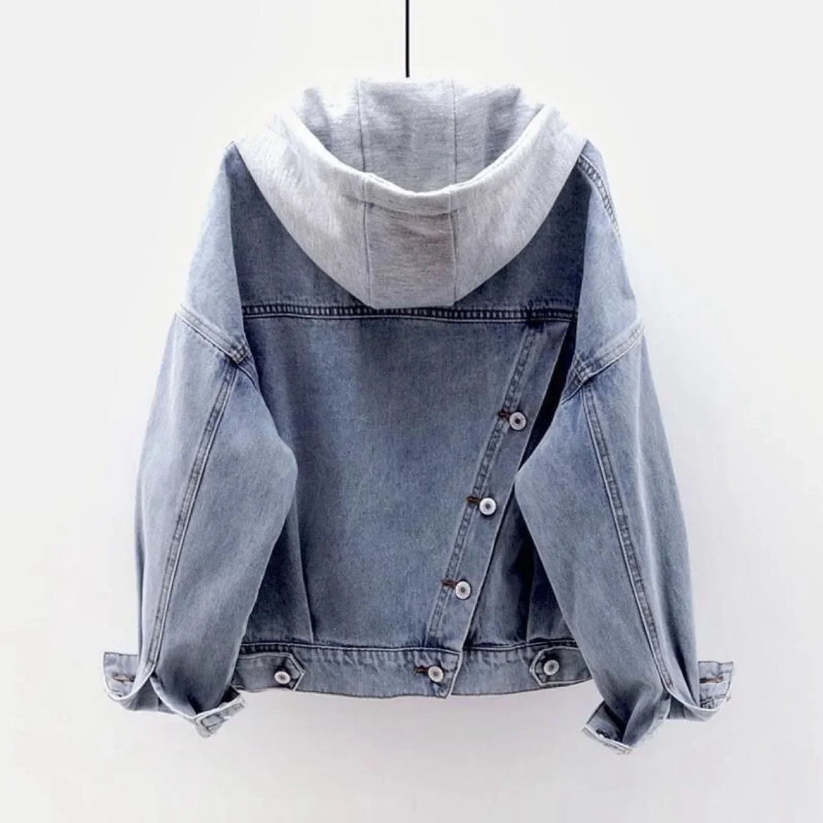 Blå denimjacka med grå avtagbar luva, lös passform