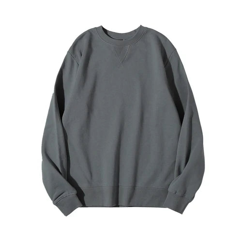 Unisex sweatshirt med rund hals, enfärgad design och ribbade muddar