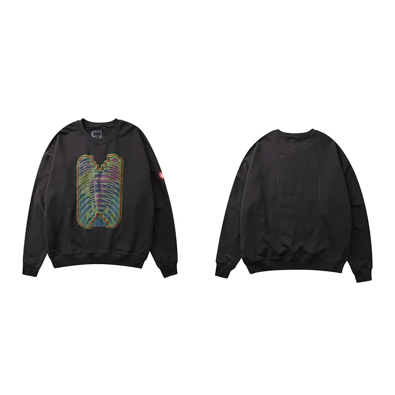 Grå Sweatshirt med svartvit tryck, rund hals och lång ärm