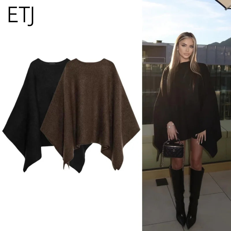 Poncho för dam i enfärgat mjukt material med rund halsringning