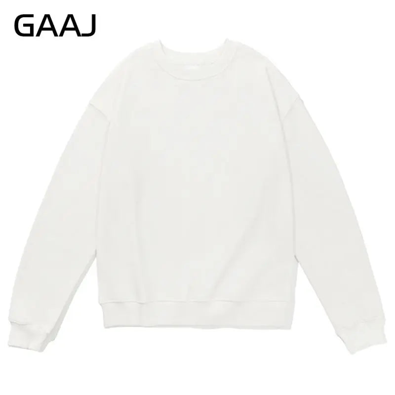 Enkel sweatshirt med rund hals, enfärgad och ribbade muddar