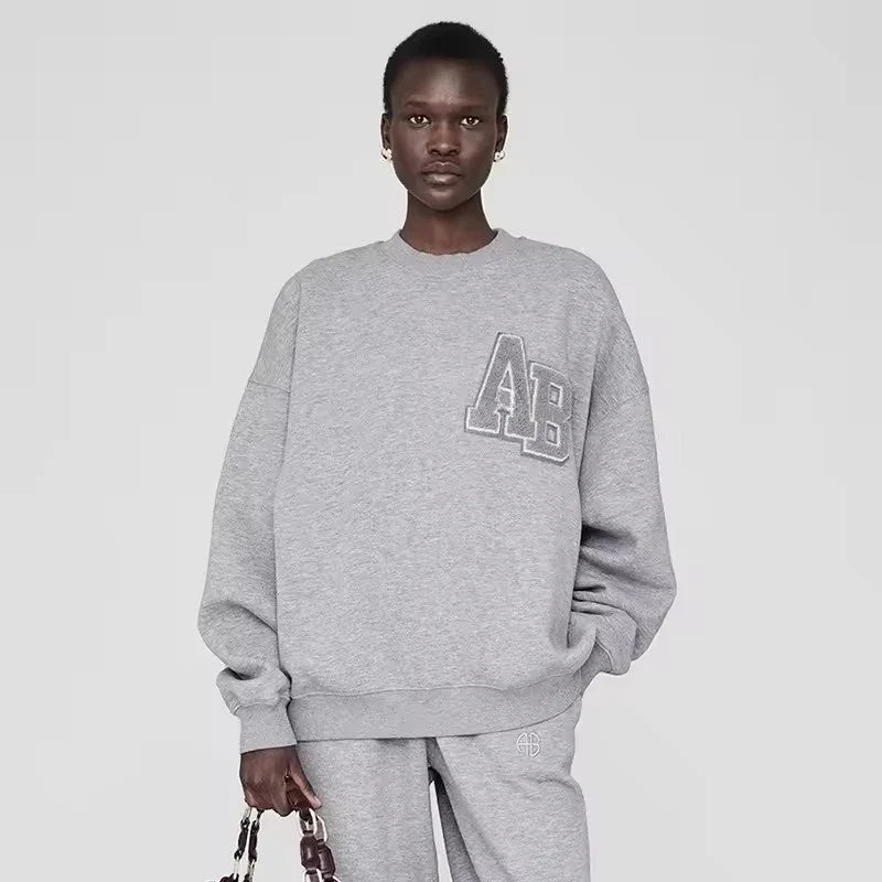 Dam sweatshirt grå med "PARIS" tryck rund hals oversized