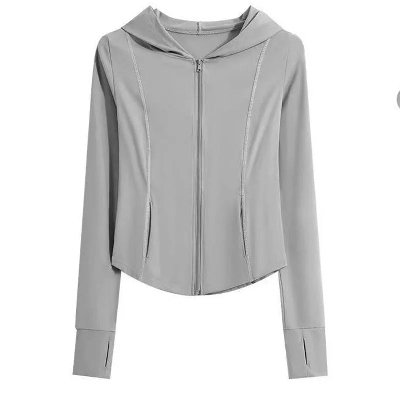Damhoodie med dragkedja, långa ärmar och tumhål