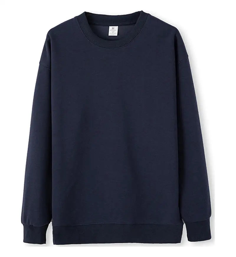 Enkel enfärgad sweatshirt med rund hals och lång ärm