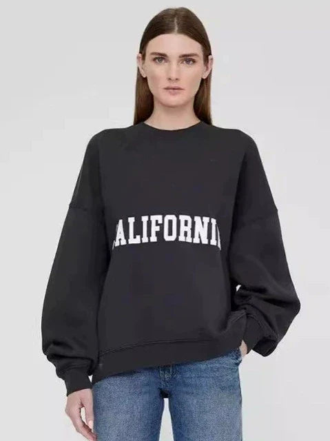 Dam sweatshirt grå med "PARIS" tryck rund hals oversized