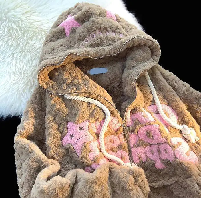 Mjuk fluffig hoodie med dragkedja och stjärnmönster