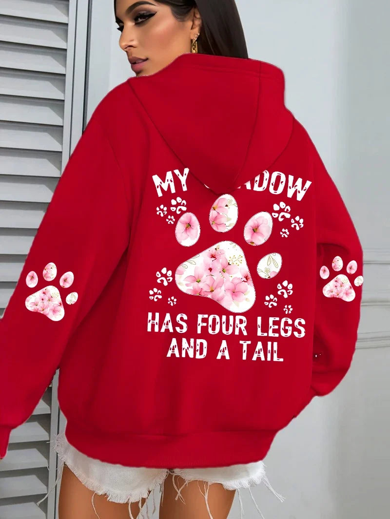 Hoodie med "My Shadow Has Four Legs And A Tail" tryck och blommiga tassar