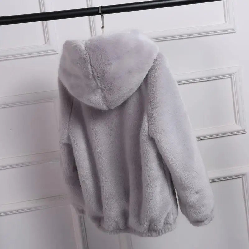 Mjuk fluffig huvtröja med lång ärm för dam