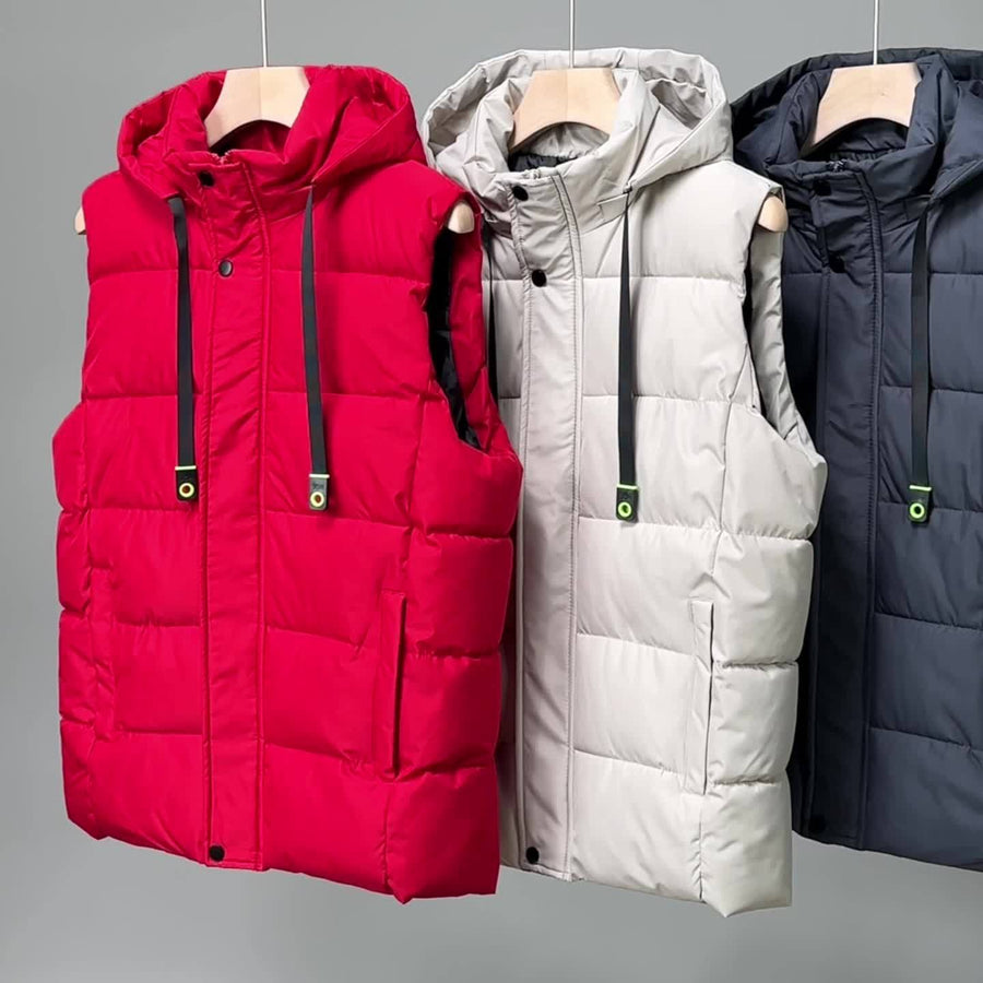 Vadderad väst med huva och dragsko, unisex, i olika färger