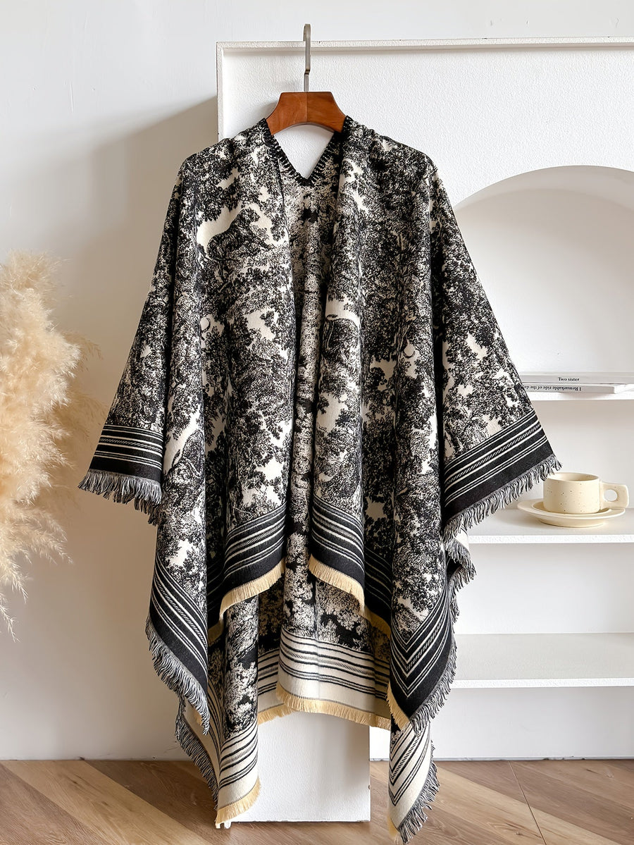 Poncho med mönster och fransar – flera färger