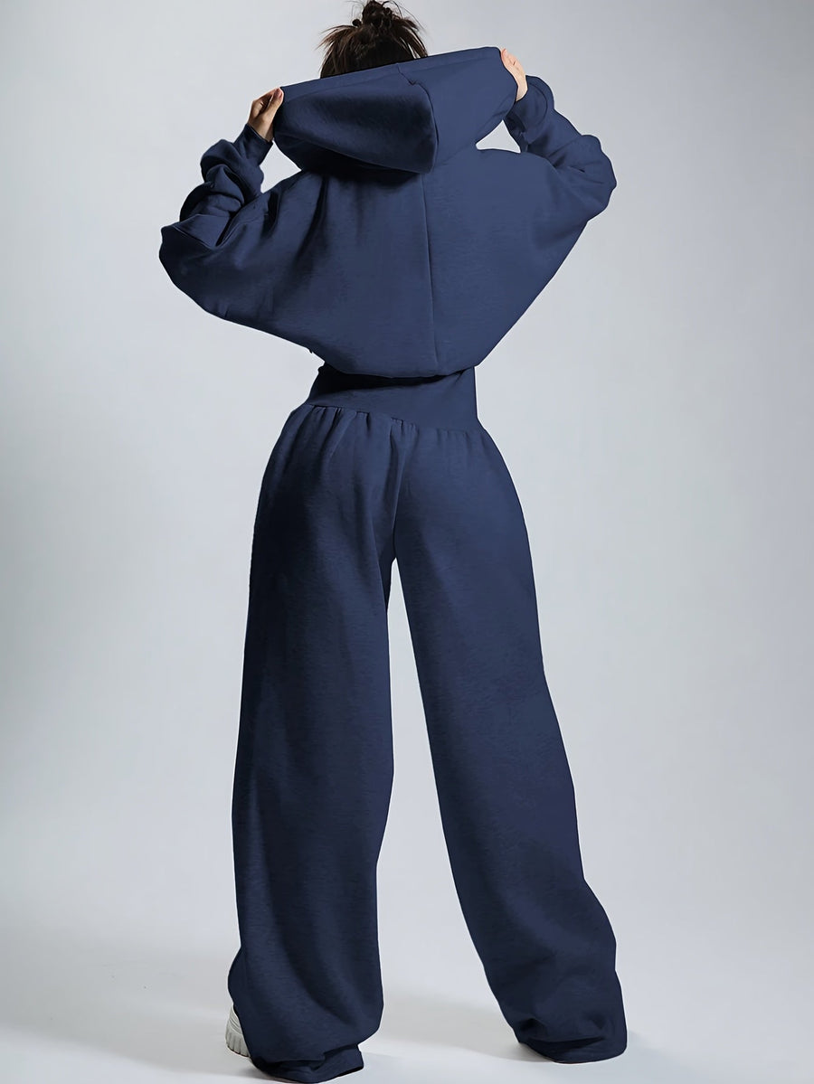 Dam jumpsuit med huva och dragkedja, vida ben
