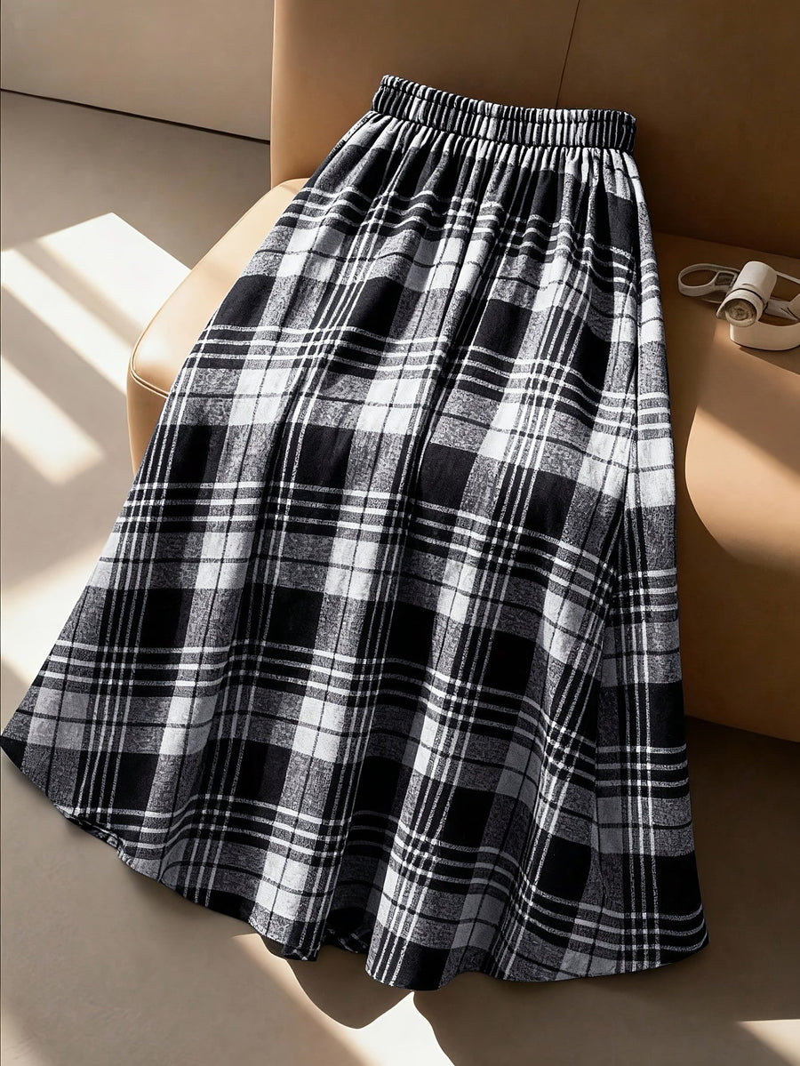 Rutig damkjol med A-linje, lång modell, elastisk midja, mjukt material