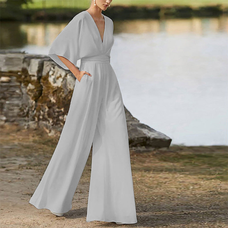 Rebecca – Klänning Jumpsuit med Djup V-hals och Hög Midja