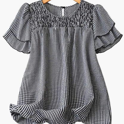 Dam Elegant Prickig Sommarblus med Rynkad Detalj och Korta Ärmar