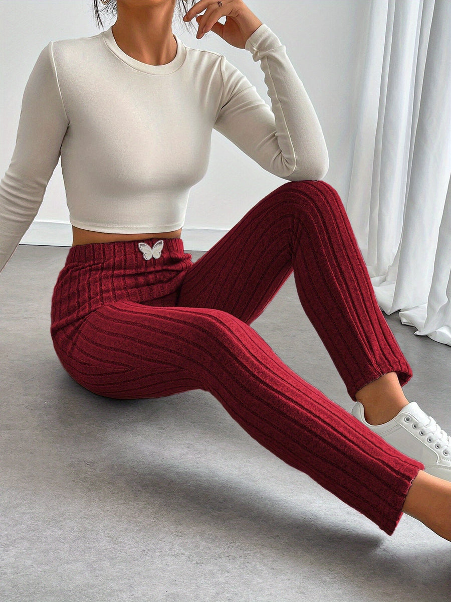 Gråa Dam Leggings med Ribbad Struktur och Fjärilsdetalj, Hög Midja