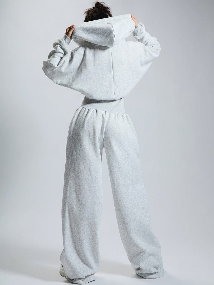Dam jumpsuit med huva och dragkedja, vida ben