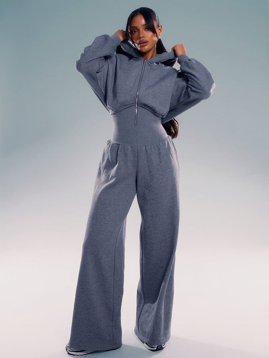 Dam jumpsuit med huva och dragkedja, vida ben