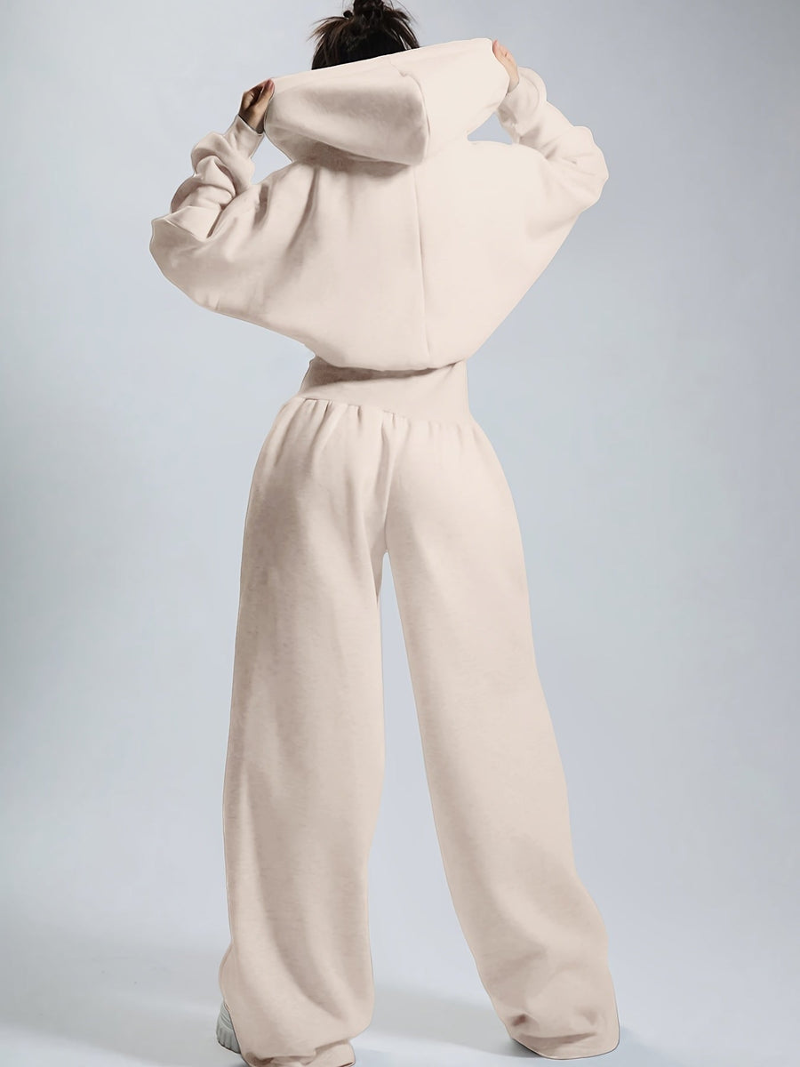 Dam jumpsuit med huva och dragkedja, vida ben