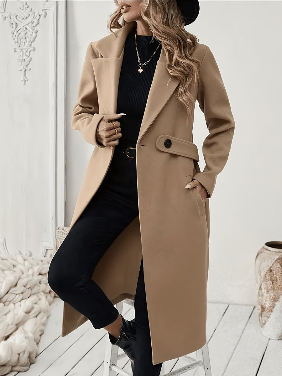 Damkappa med slag och fickor, lång modell i enfärgad design
