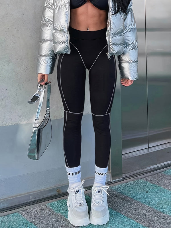 Svarta leggings med kontrasterande sömmar, hög midja