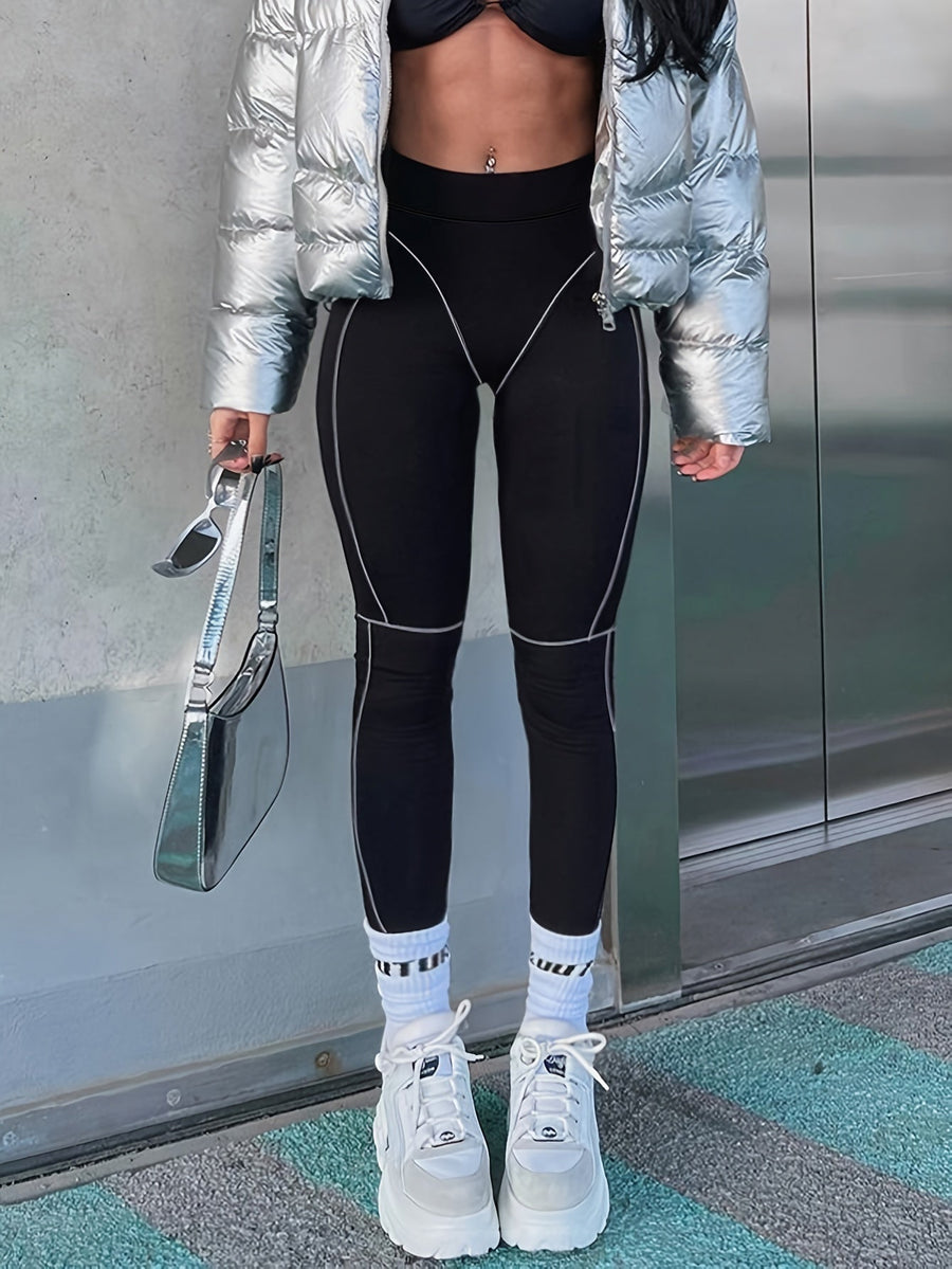 Svarta leggings med kontrasterande sömmar, hög midja