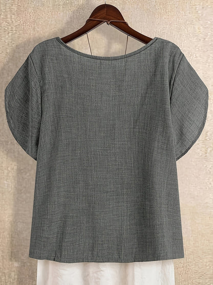 Dam Kortärmad Tunika Blus med Asymmetrisk Krage och Knappdetalj – Elegant och Avslappnad Stil