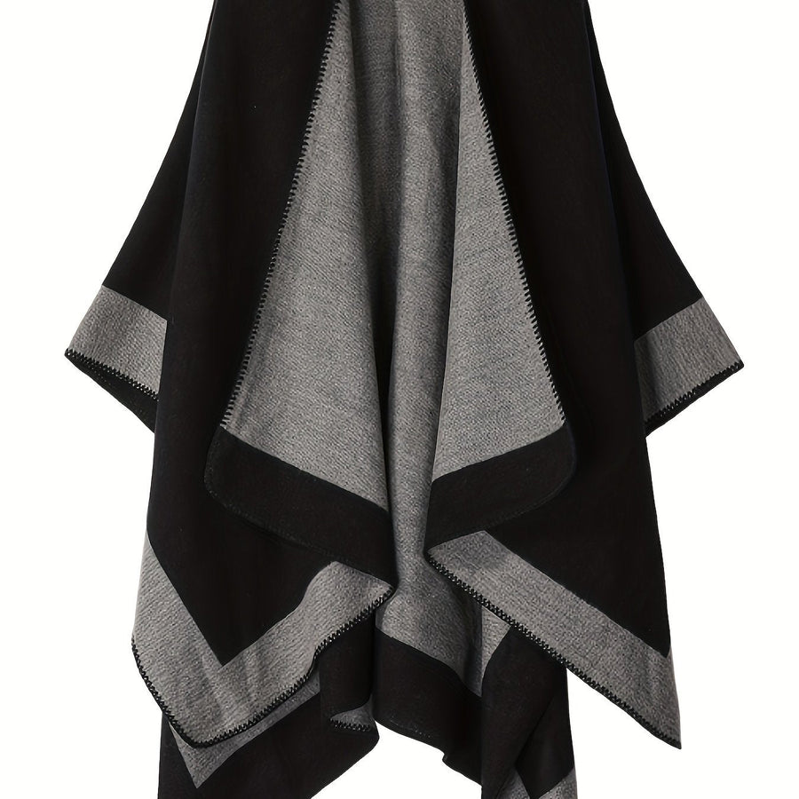Svart och grå vändbar poncho med båthals och fransfria kanter