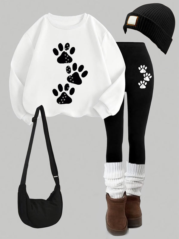 Set med sweatshirt och leggings med tassavtryck